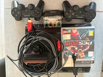 PS3 Slim con accessori