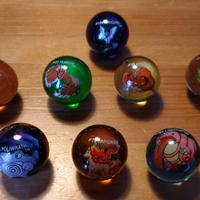 Set 10xbiglie vintage Pokémon +astuccio Charmeleon