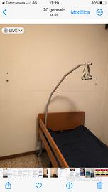 Letto elettrico , materasso e gancio alza malati