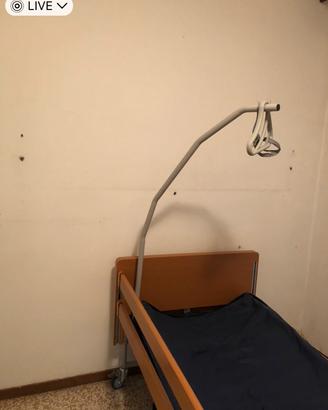Letto elettrico , materasso e gancio alza malati