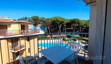 Appartamento con piscina e giardino