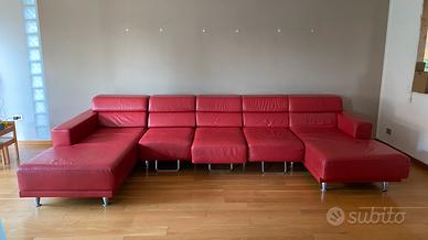 Divano in pelle con doppia chaise longue