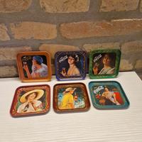 Set sottobicchieri vintage in latta coca cola