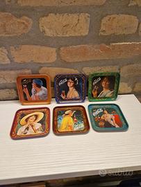 Set sottobicchieri vintage in latta coca cola