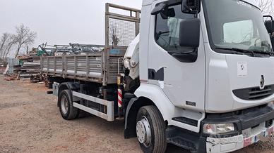 autocarro ribaltabile con gru