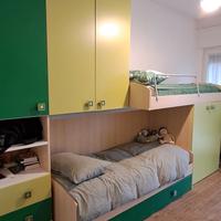 Camera a castello tre letti