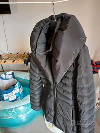 giacca messe poche  volte n 42 non passa la pioggi