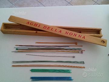 Ferri lavoro a maglia e porta ferri