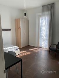 Ampia Camera in appartamento Mazzini L95