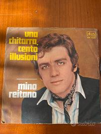 45 giri Mino Reitano, “Una chitarra 100illusionu”.