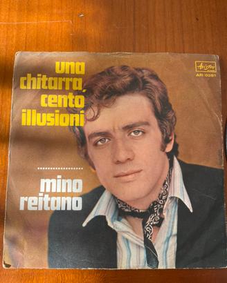 45 giri Mino Reitano, “Una chitarra 100illusionu”.
