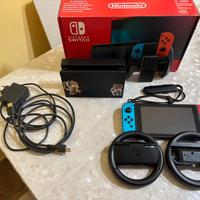 Nintendo switch+Mario kart 8 Deluxe+volanti