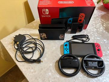 Nintendo switch+Mario kart 8 Deluxe+volanti