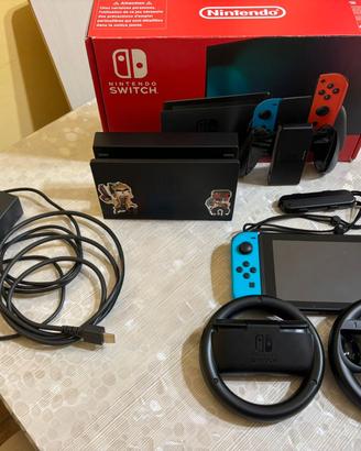 Nintendo switch+Mario kart 8 Deluxe+volanti