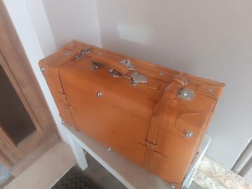 valigia cuoio vacchetta 