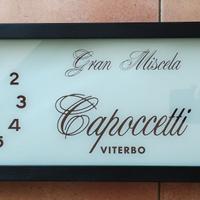 Orologio pubblicitario da parete, vintage anni '70