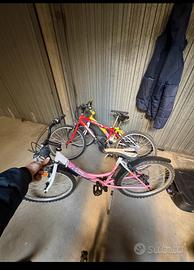 Bici da ragazzina rosa e bianca