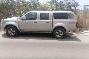 Nissan Navara Autocarro con cassone + cabina allun