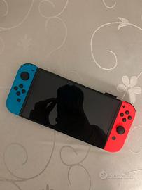 Nintendo Switch OLED + ACCESSORI