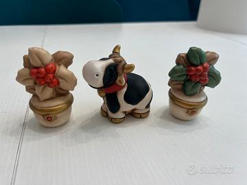 Mucca e piantine thun