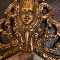 Specchioin bronzo dorato