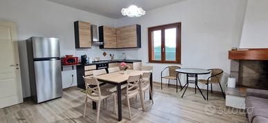 Porzione di Villa Bifamiliare con giardino