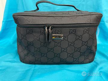 Gucci beauty in tela e pelle  nera GG