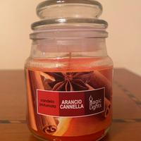 Candela profumata all’arancia e cannella