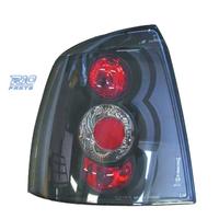 FANALI OPEL ASTRA G 2P 4P 97-04 FONDO NERO