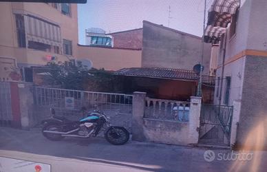 Resede parzialmente coperta per 4 posti auto