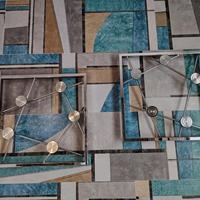 attaccapanni di design in ferro color acciaio 