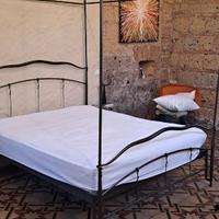 Letto baldacchino ferro battuto