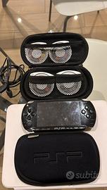 PSP sony 1000 + 4giochi + custodia + caricatore
