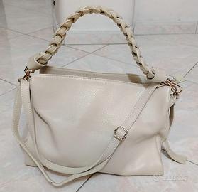 Borsa in pelle color panna da donna firmata.