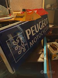 insegna Peugeot 