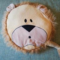 cuscino tondo a forma di leone 