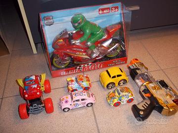 Lotto macchinine a trazione + pistola spaziale.