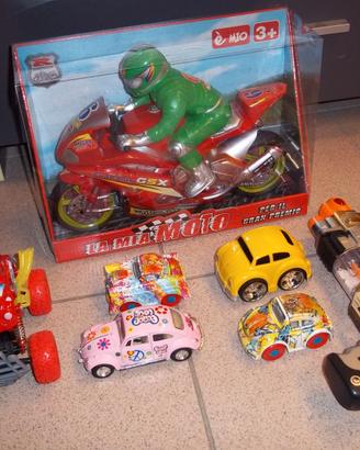 Lotto macchinine a trazione + pistola spaziale.