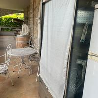 Frigo con tendina