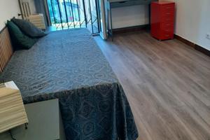 Camera con balcone a Saronno