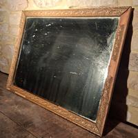 Specchiera con cornice lavorata 