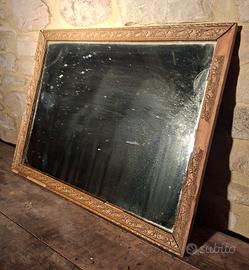 Specchiera con cornice lavorata 