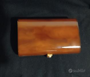 pochette in bachelite stile tartaruga