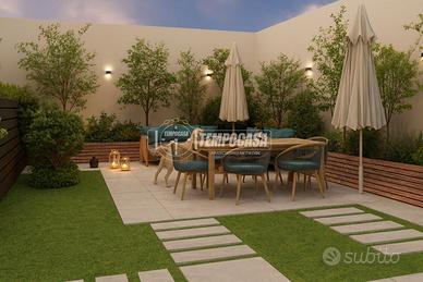 4 LOCALI CON GIARDINO DI 26 MQ IN STABILE DI NUOVA