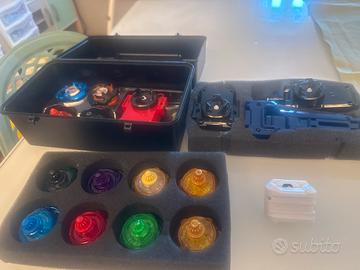 Set trottole 12 pezzi con lanciatori e valigetta