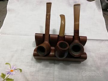 Tre pipe e portapipe 