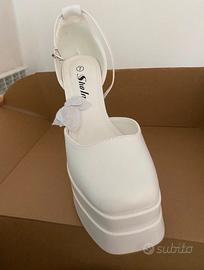 Scarpe bianche con il tacco