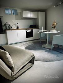 Terra tetto con giardino piscina sauna Cortona