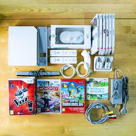 Nintendo Wii + 2 controller, 9 giochi e accessori