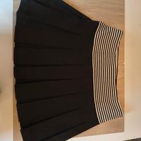 Gonna a pieghe elastica